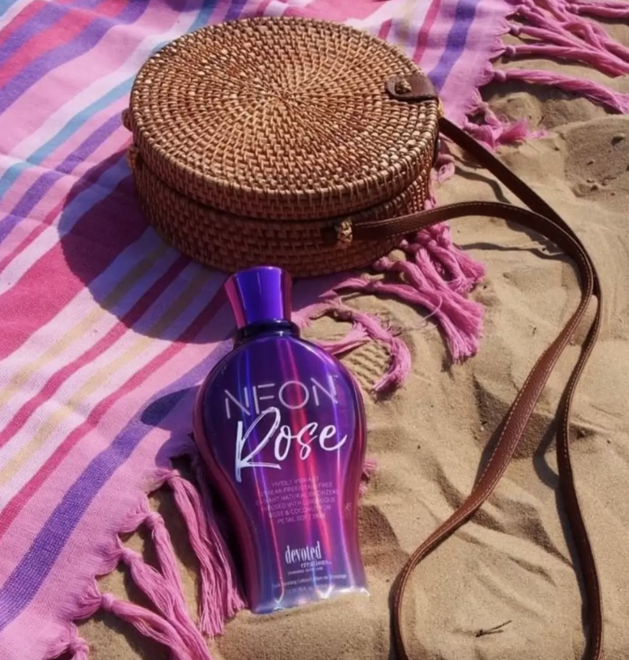 Devoted Creations Neon Rose Tanning Lotion with Natural Bronzers 12.25 oz